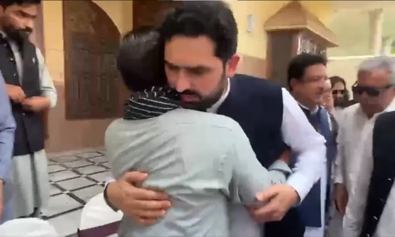 Khyber Pakhtunkhwa Chief Minister Sohail Afridi hugs the father of a minor girl who was raped and murdered, in Haripur on Aug 29, 2026. &mdash; X/PTIKPOfficial