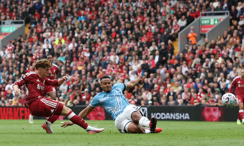 LIVERPOOL: Liverpool&rsquo;s Victor Munoz (L) scores the equaliser during the Premier League match against Nottingham Forest at Anfield on Saturday.&mdash;Reuters