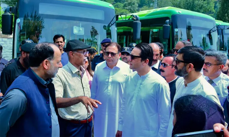 OFFICIALS brief Azad Kashmir Prime Minister Iftikhar Gillani on arrangements for the launch of green buses gifted by the Punjab government.—Dawn OFFICIALS brief Azad Kashmir Prime Minister Iftikhar Gillani on arrangements for the launch of green buses gifted by the Punjab government.—Dawn
