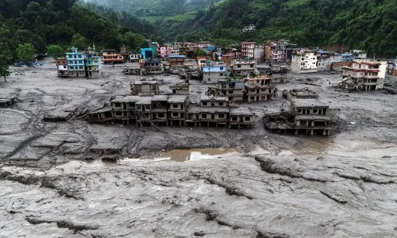 A drone view shows damaged buildings and houses covered in mud next to the Likhu River following deadly flash floods and mudslides, in Devighat, Nuwakot district, Nepal, August 30. — Reuters A drone view shows damaged buildings and houses covered in mud next to the Likhu River following deadly flash floods and mudslides, in Devighat, Nuwakot district, Nepal, August 30. — Reuters