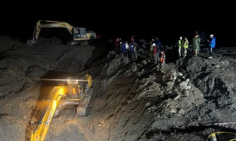 Rescuers use diggers to clear way to a tunnel of the Trishuli 3A Hydropower Project, following deadly flash floods and a mudslide, in Nuwakot district, Nepal, in this handout, obtained by Reuters on August 31, 2026. &mdash;Reuters
