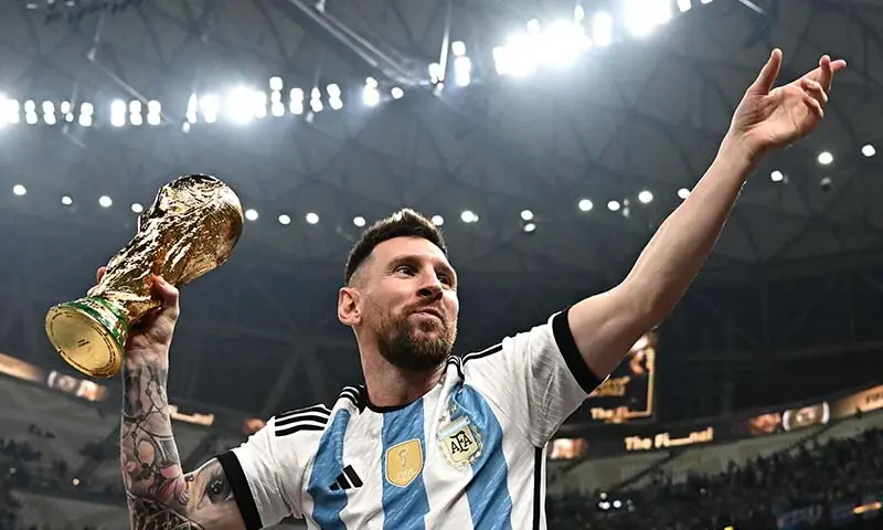Argentina's captain Lionel Messi poses with the FIFA World Cup Trophy after winning the Qatar 2022 World Cup Final football match against France at Lusail Stadium in Lusail, north of Doha, Qatar on December 18, 2022. — AFP/File Argentina's captain Lionel Messi poses with the FIFA World Cup Trophy after winning the Qatar 2022 World Cup Final football match against France at Lusail Stadium in Lusail, north of Doha, Qatar on December 18, 2022. — AFP/File