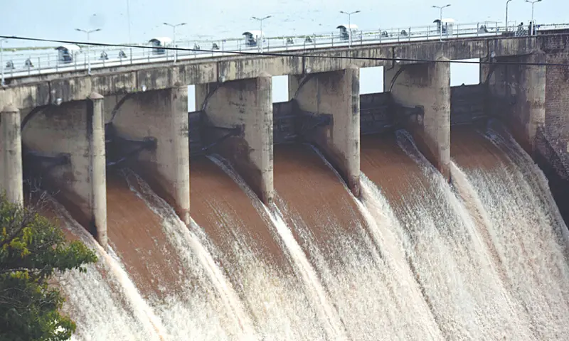 Water gushes through the spillways of Rawal Dam after they were opened in Islamabad on Monday. &mdash; Online