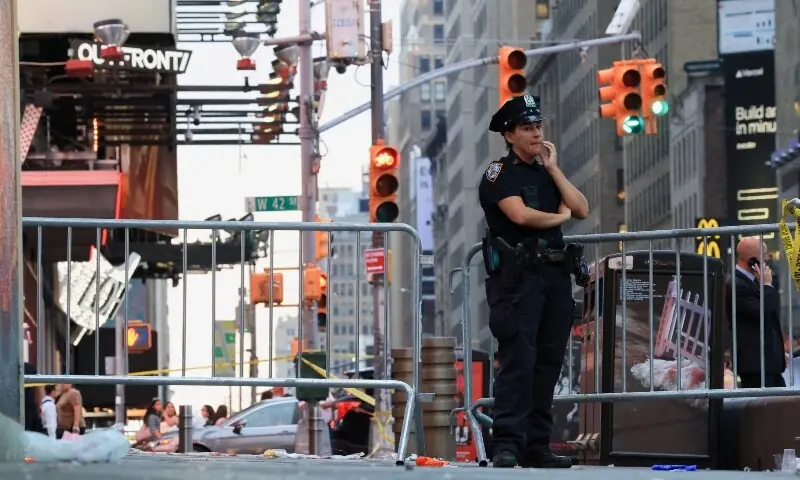A member of the NYPD stands guard at the scene of an officer-involved shooting, in Times Square, New York City, US on August 31, 2026. — Reuters A member of the NYPD stands guard at the scene of an officer-involved shooting, in Times Square, New York City, US on August 31, 2026. — Reuters