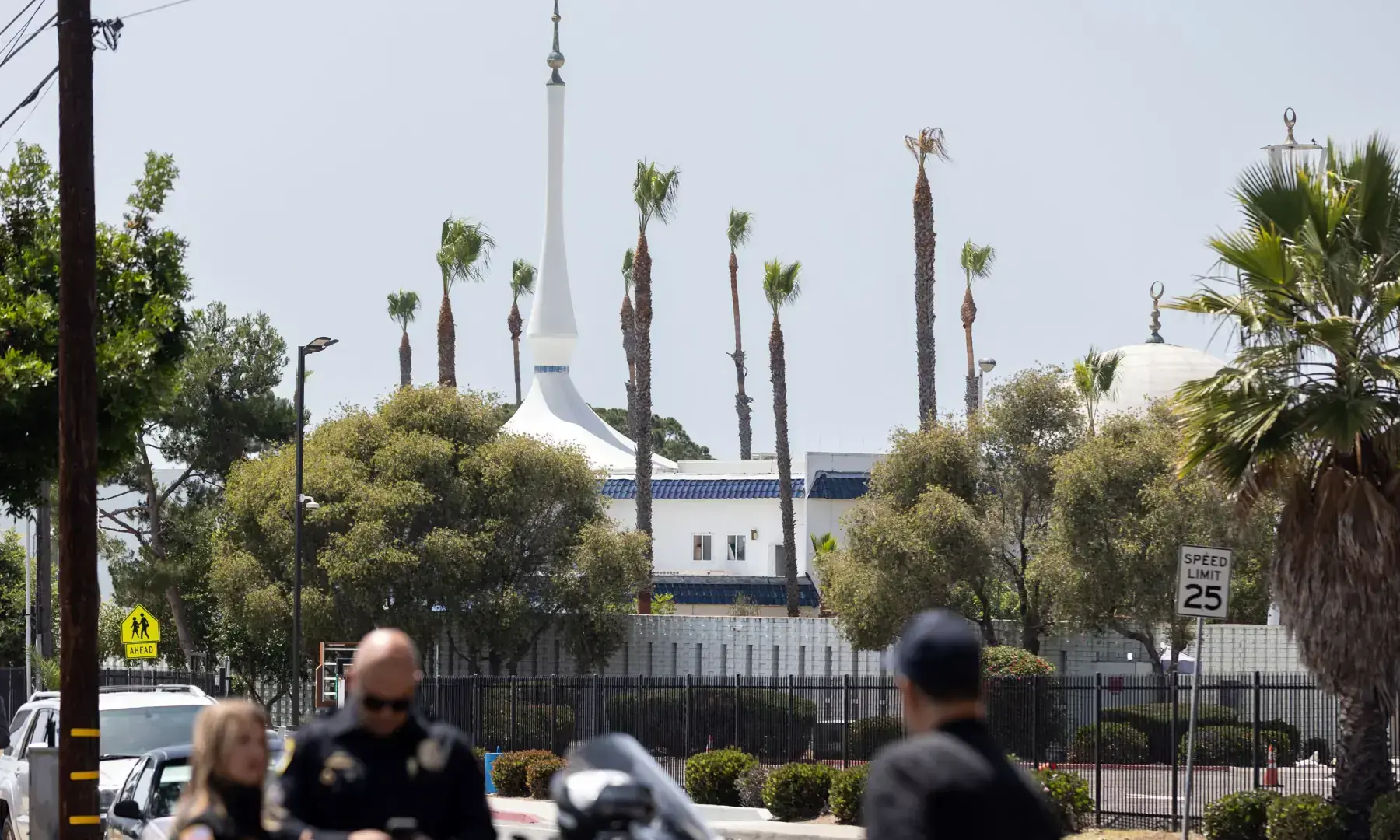 San Diego police officers stand blocking the road to the Islamic Center of San Diego following a shooting in southern California on May 18, 2026. — AFP/File San Diego police officers stand blocking the road to the Islamic Center of San Diego following a shooting in southern California on May 18, 2026. — AFP/File