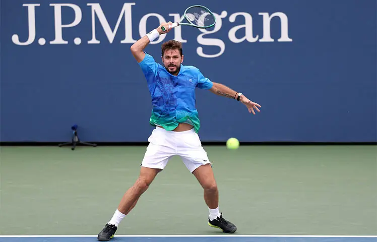 SWITZERLAND&rsquo;S Stan Wawrinka hits a return against Matteo Berrettini of Italy during their US Open first-round match at the Flushing Meadows.&mdash;Reuters