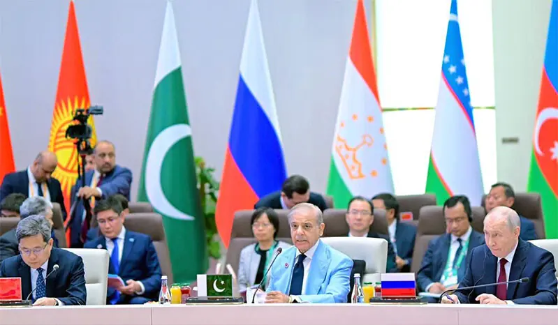 Russian President Vladimir Putin listens as PM Shehbaz Sharif addresses the SCO summit.—APP Russian President Vladimir Putin listens as PM Shehbaz Sharif addresses the SCO summit.—APP