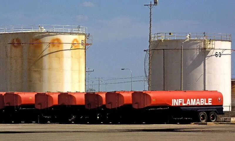 Oil trucks are pictured stationed in an oil refinery in Maracaibo, Venezuela on December 18, 2002. &mdash; AFP