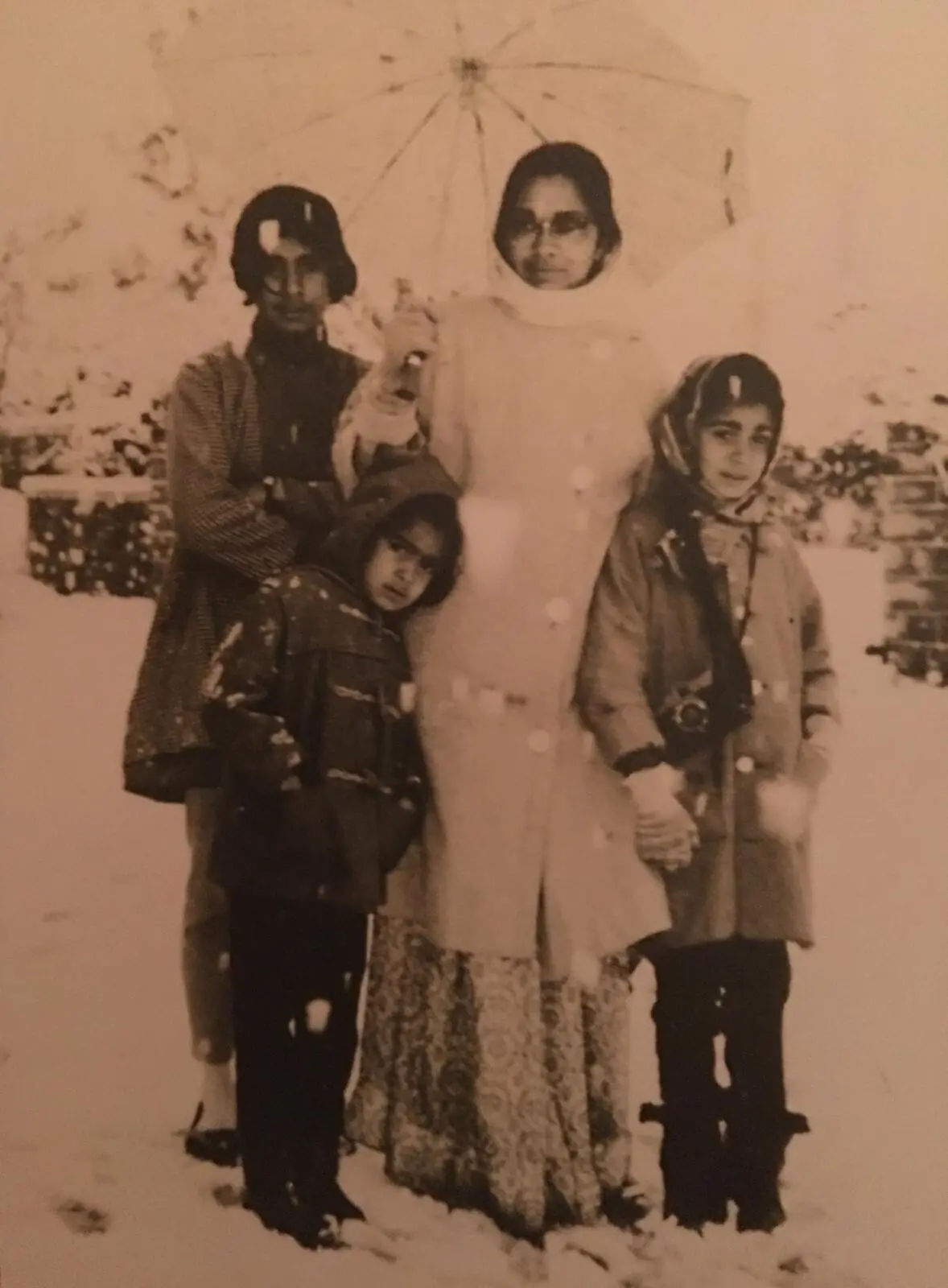 Indu Mitha with her daughters. Photo: Tehreema Mitha