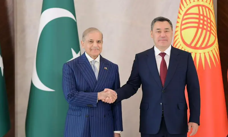 Prime Minister Shehbaz Sharif and Kyrgyz President Sadyr Zhaparov pose for a photograph in Bishkek on Sept 2. &mdash; Govt of Pakistan/X