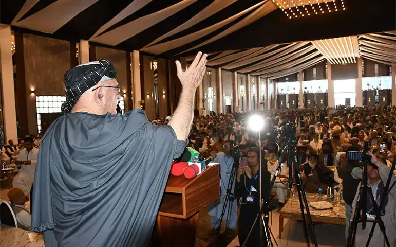 PkMAP chief Mehmood Khan Achakzai addresses the jirga.&mdash;Dawn/File