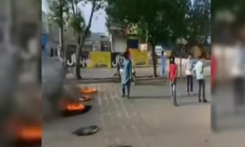Tyres burning on a road at Karachi's Korangi Crossing on September 3. — DawnNewsTV Tyres burning on a road at Karachi's Korangi Crossing on September 3. — DawnNewsTV