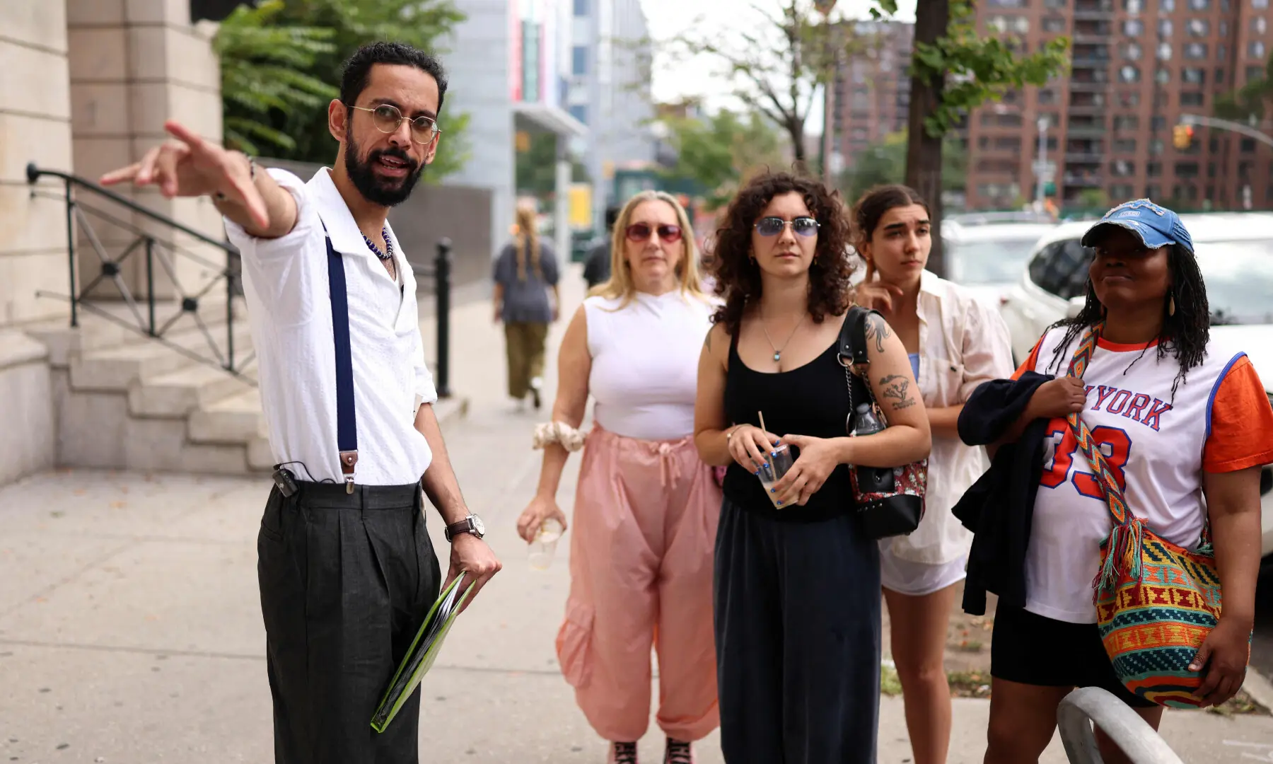 Asad Dandia conducts a guided tour about Malcolm X in the Harlem area of New York on Aug 22, 2026. — AFP Asad Dandia conducts a guided tour about Malcolm X in the Harlem area of New York on Aug 22, 2026. — AFP