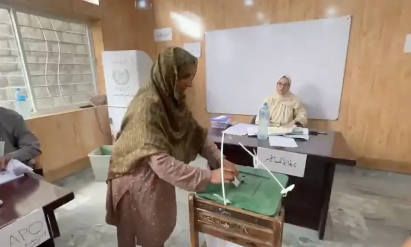 A woman casts her vote at a polling station. — screengrab via PTV News/X A woman casts her vote at a polling station. — screengrab via PTV News/X