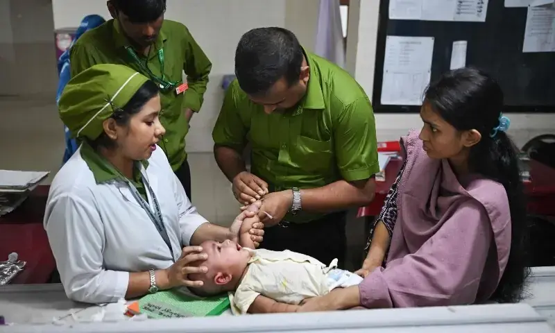 A child receives treatment for measles, at Bangladesh Shishu Hospital & Institute in Dhaka on Sept 3, 2026. — AFP