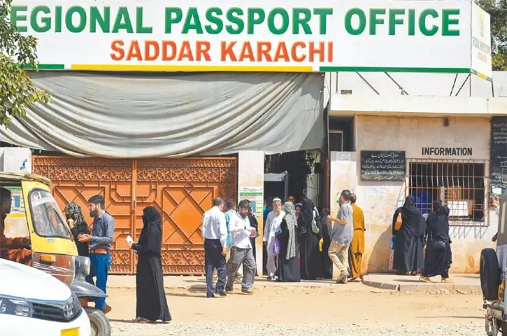 Applicants outside the regional passport office in Karachi's Saddar.&mdash;White Star/File