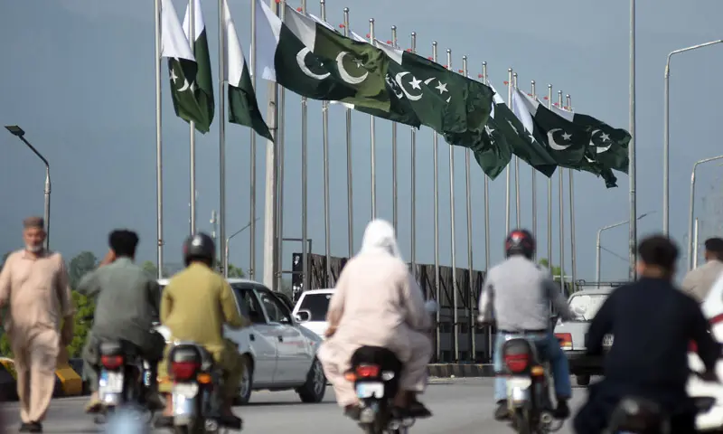 ISLAMABAD: The national flag on display along Faizabad interchange ahead of Defence Day, to be celebrated on Sunday.&mdash;Online
