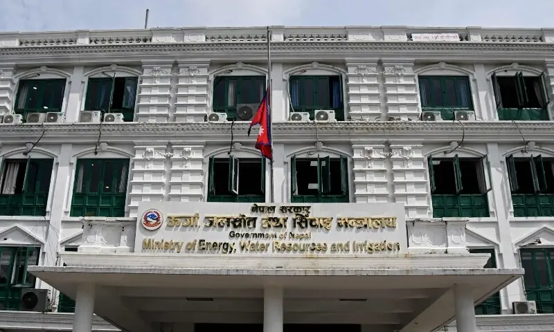 Nepal's national flag flies at half-mast as the country observes national day of mourning in the aftermath of flash floods in Kathmandu on September 7. &mdash; AFP