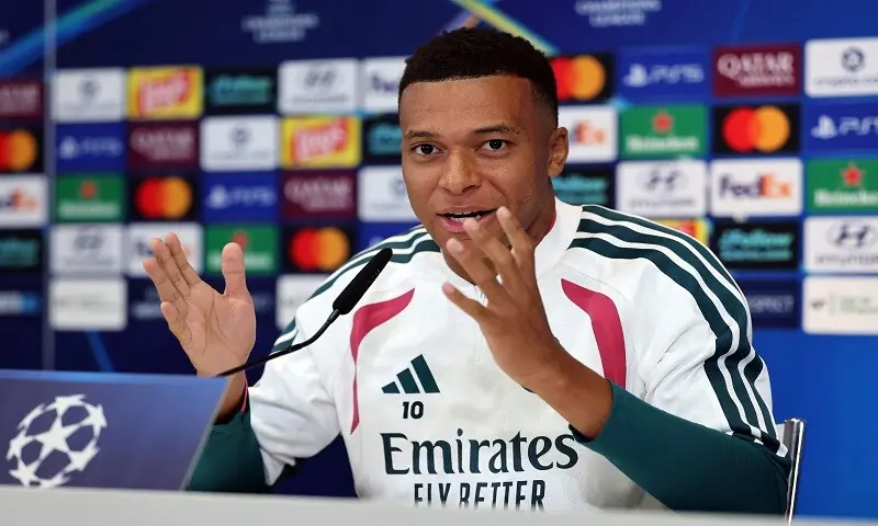 Real Madrid's Kylian Mbappe gestures during a press conference at the Ciudad Real Madrid training ground in Madrid on September 7, 2026.&mdash;AFP