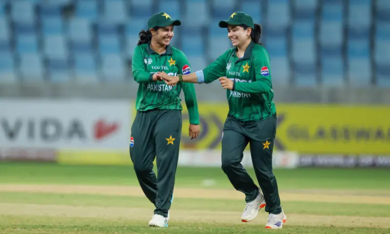 Pakistan spinner Nashra Sandhu (L) celebrates with captain Fatima Sana during their Women's Asia Cup match against Hong Kong at the Dubai International Cricker Stadium in Dubai on September 7, 2026.&mdash;Courtesy Asian Cricket Council