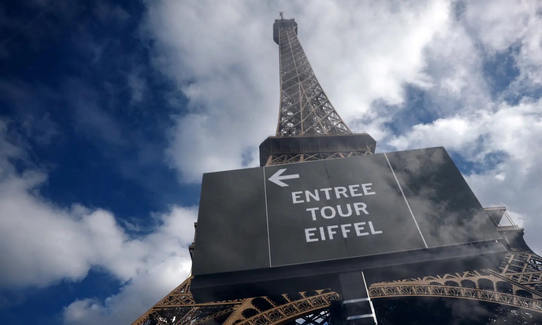 A sign reading &ldquo;the opening of the Eiffel Tower is delayed for operational reasons, we apologize&rdquo; is seen at the Eiffel Tower in Paris, France, on Sept 7, 2026. &mdash; Reuters