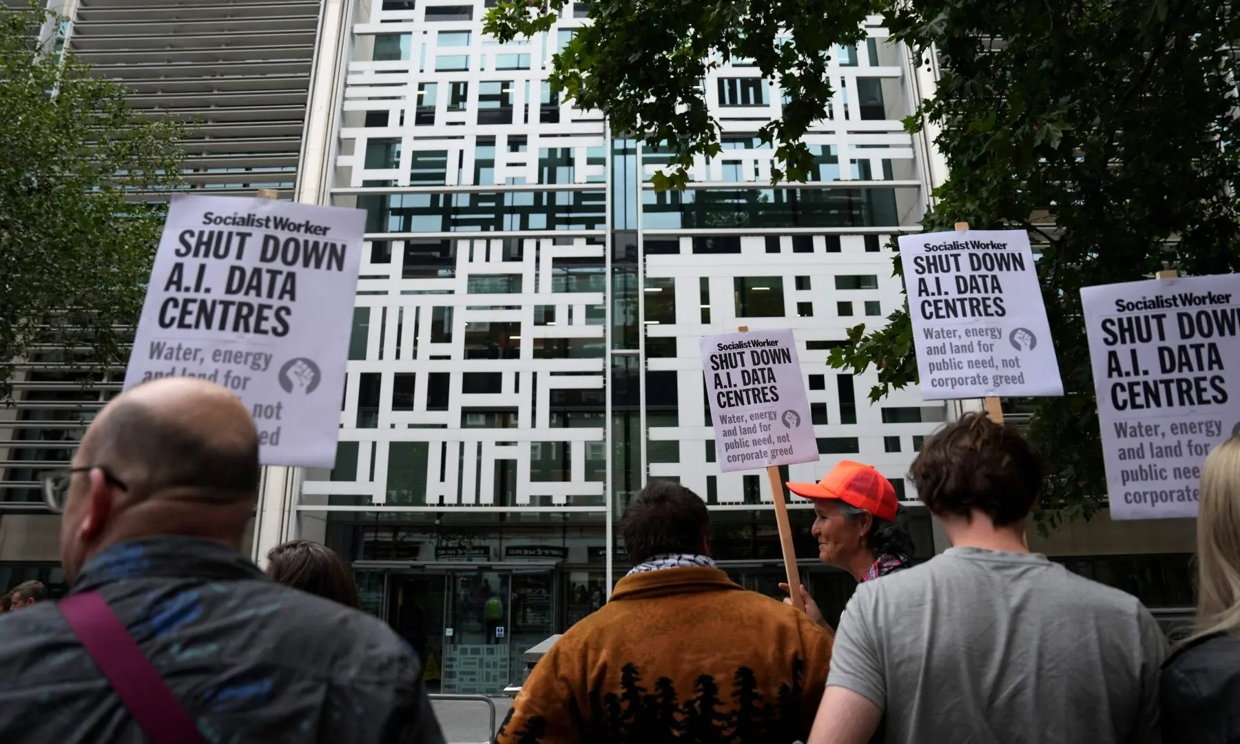 This photo taken on September 4, 2026 shows people holding placards against the approval of a data centre in the government’s redevelopment plans for Brick Lane, outside the Ministry of Housing offices in London. —AFP