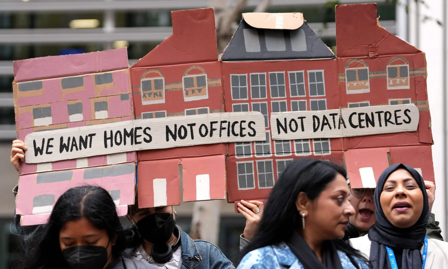 This photo taken on September 4, 2026 shows people holding placards against the approval of a data centre in the government's redevelopment plans for Brick Lane, outside the Ministry of Housing offices in London. —AFP This photo taken on September 4, 2026 shows people holding placards against the approval of a data centre in the government's redevelopment plans for Brick Lane, outside the Ministry of Housing offices in London. —AFP