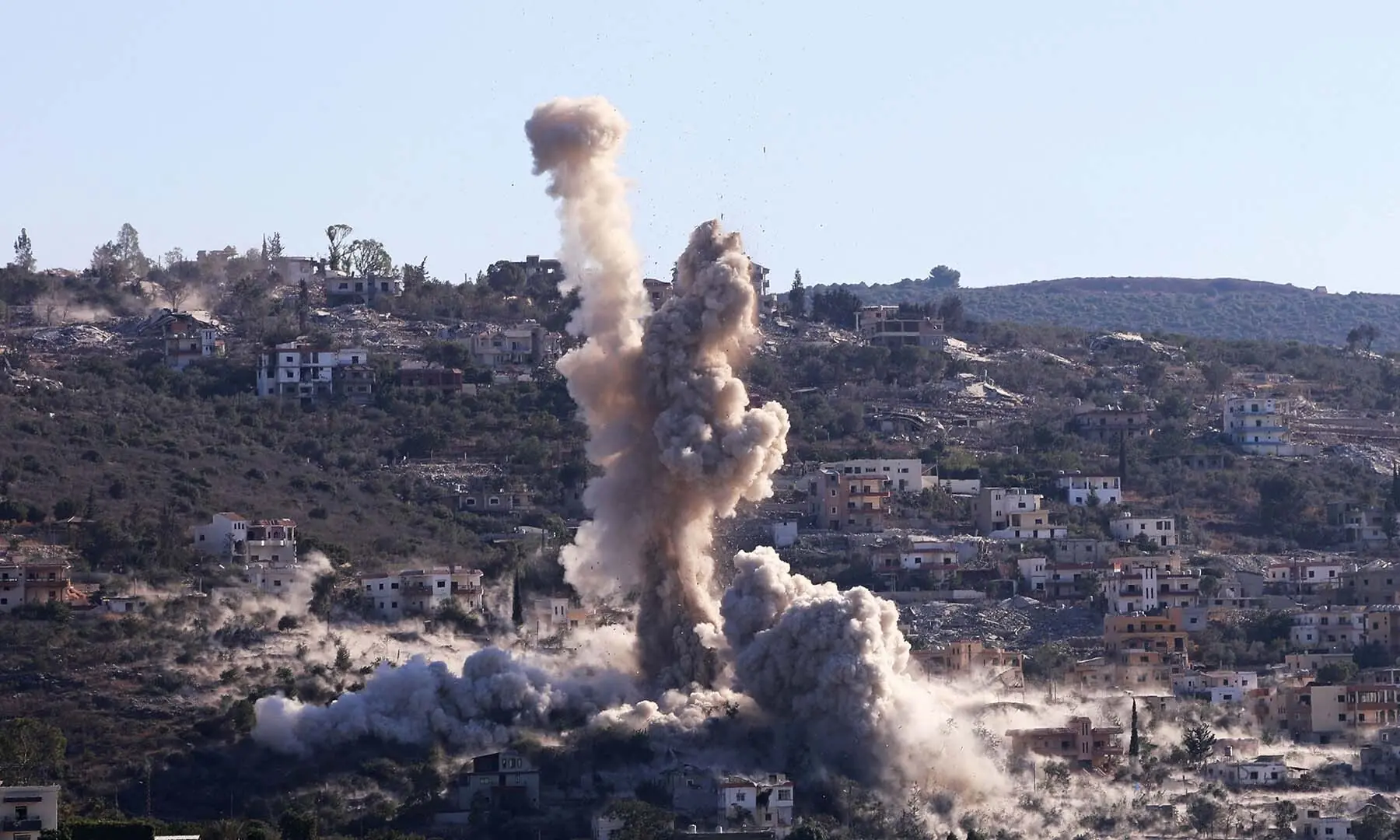 This photograph taken from the southern Lebanese village of al-Hanniyeh shows smoke rising from the site of an Israeli controlled explosion in the area of al-Mansouri on September 8, 2026. &mdash; AFP