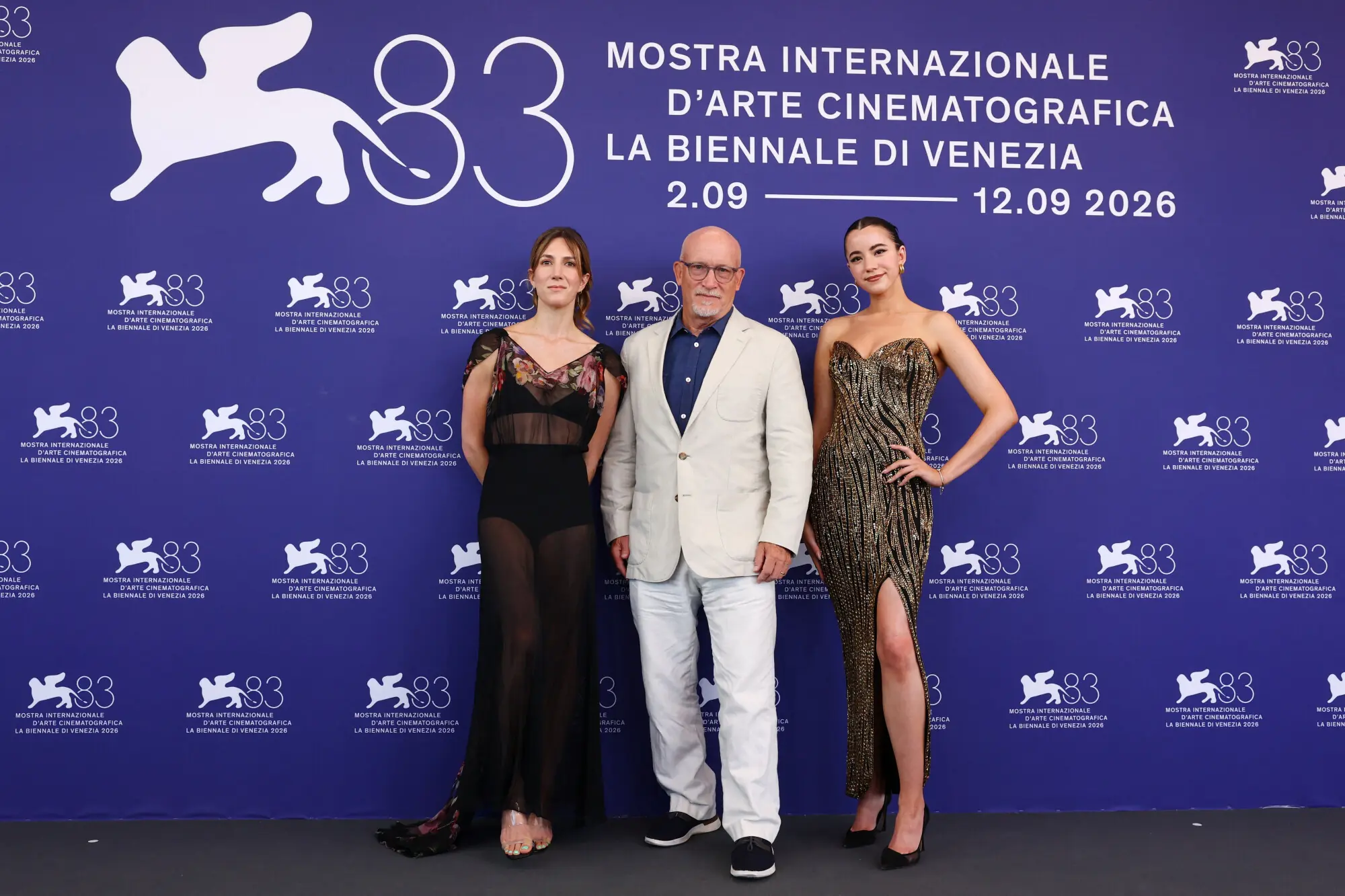 Director Alex Gibney, Ashley St. Clair and Zoe Schiffer pose during a photocall for the documentary at the Venice Film Festival — Reuters
