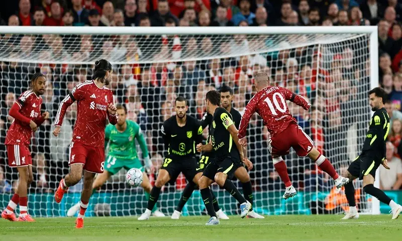 Liverpool's Alexis Mac Allister scores against Atletico Madrid during their Champions League match at Anfield in Liverpool on September 9, 2026. —Reuters Liverpool's Alexis Mac Allister scores against Atletico Madrid during their Champions League match at Anfield in Liverpool on September 9, 2026. —Reuters