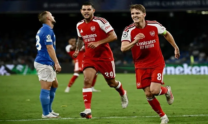 Arsenal's Martin Odegaard (R) celebrates after scoring against Napoli during their Champions League match at Stadio Diego Armando Maradona in Naples on September 9, 2026. —AFP Arsenal's Martin Odegaard (R) celebrates after scoring against Napoli during their Champions League match at Stadio Diego Armando Maradona in Naples on September 9, 2026. —AFP