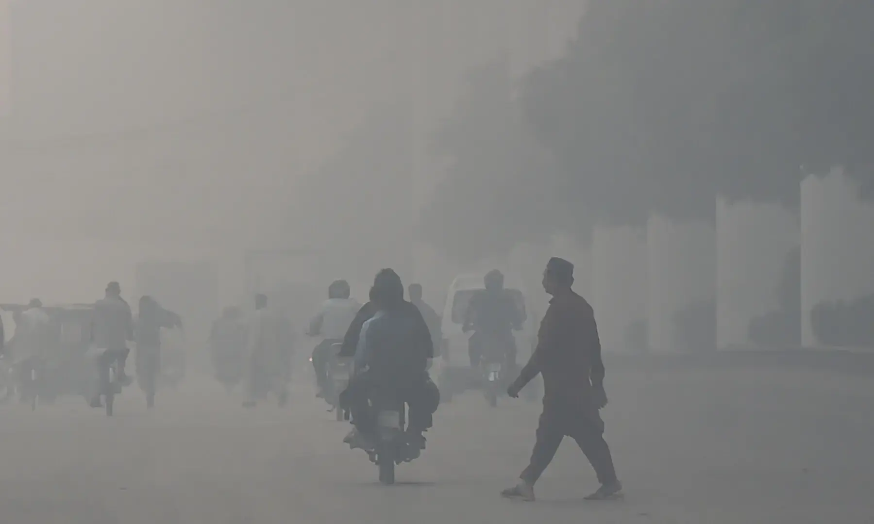 Commuters drive along a road amid dense smog in Lahore on Oct 29, 2025. — AFP/File Commuters drive along a road amid dense smog in Lahore on Oct 29, 2025. — AFP/File