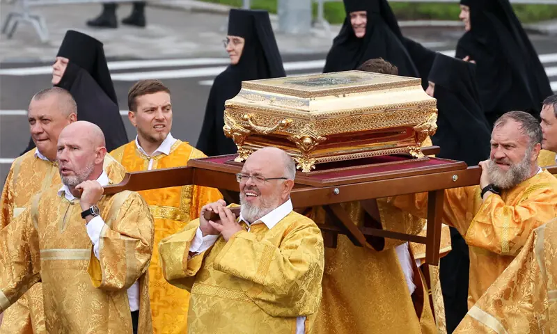 Bearers carry a case with relics of medieval Russian prince Dmitry Donskoy during a procession marking the Feast of the Moscow Saints.&mdash;Reuters