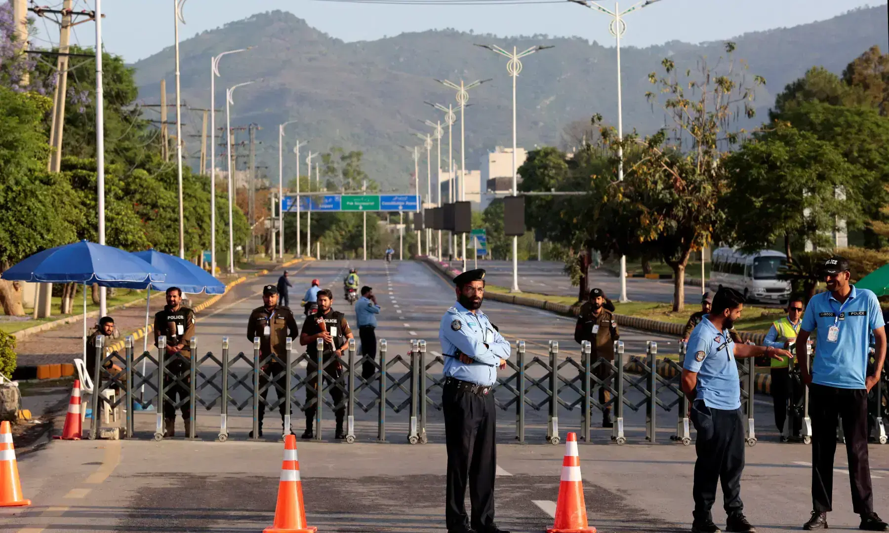 Police officers stand guard next to a barricade near Serena Hotel, as Pakistan prepares to host the US and Iran for the second round of peace talks, in Islamabad, on April 25, 2026. &mdash; Reuters/File