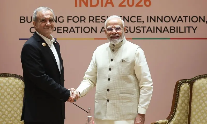 This handout photograph taken and released by the Indian Press Information Bureau (PIB) on September 11, 2026, shows India's Prime Minister Narendra Modi shaking hands with Iran's President Masoud Pezeshkian during their bilateral meeting on the sidelines of BRICS Summit in New Delhi, India. &mdash; AFP