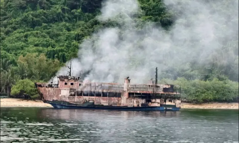 Smoke rises from the burnt MV June Aster ferry, a day after a fire broke out on the vessel, off the coast of Palawan, Philippines on September 11, 2026. &mdash; Reuters/ File