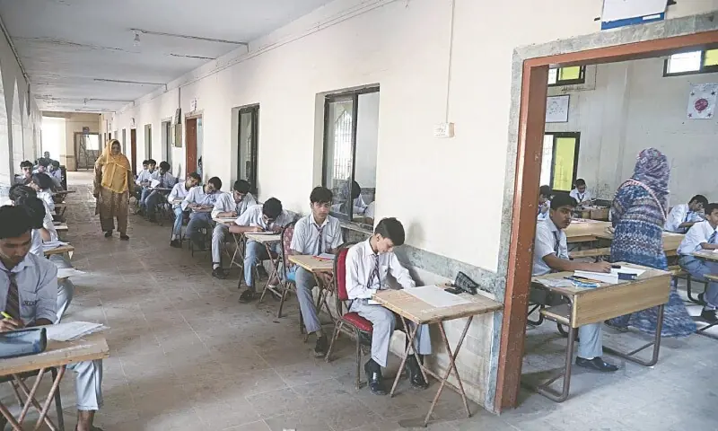 This file photo, used for representational purposes, shows students take their exam while sitting in the corridor of an examination centre at Karachi's Govt Boys Secondary School Jail Road without any fan amid hot weather on Monday.—PPI/ File This file photo, used for representational purposes, shows students take their exam while sitting in the corridor of an examination centre at Karachi's Govt Boys Secondary School Jail Road without any fan amid hot weather on Monday.—PPI/ File