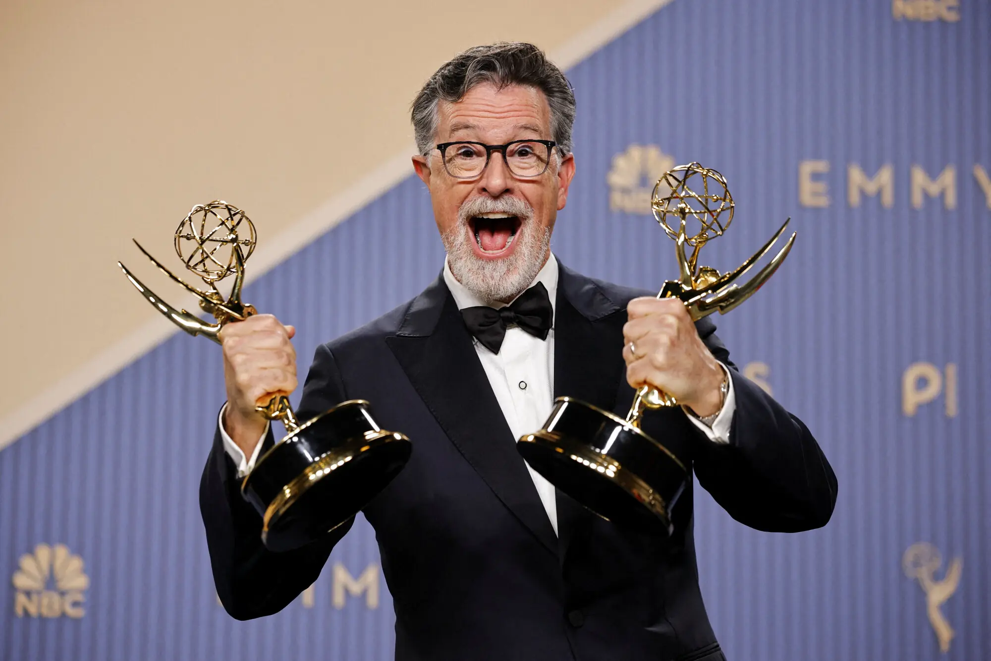 Stephen Colbert poses with the Best Variety Show honours he won for the last season of The Late Show