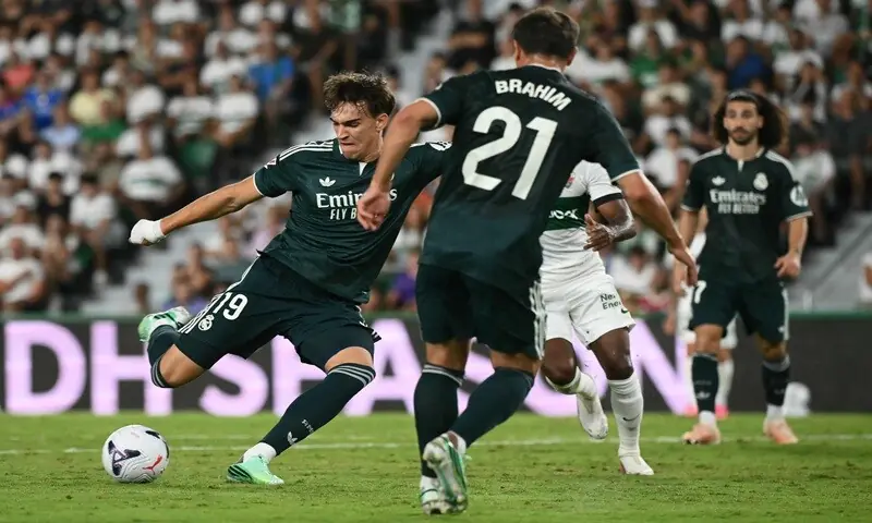 Real Madrid's Carlos Espi Escrihuela (L) shoots to score against Elche during their La Liga match at Martinez Valero Stadium in Elche on September 15, 2026. —AFP Real Madrid's Carlos Espi Escrihuela (L) shoots to score against Elche during their La Liga match at Martinez Valero Stadium in Elche on September 15, 2026. —AFP