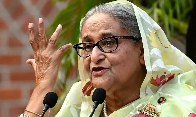 Bangladesh's former prime minister Sheikh Hasina gestures while speaking to the media in Dhaka on January 8, 2024. &mdash; AFP/File