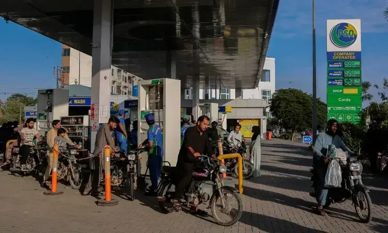 People get fuel at a petrol station, as fuel prices in Pakistan rise, amid the US-Israeli conflict with Iran, in Karachi on April 3, 2026. &mdash; Reuters/File