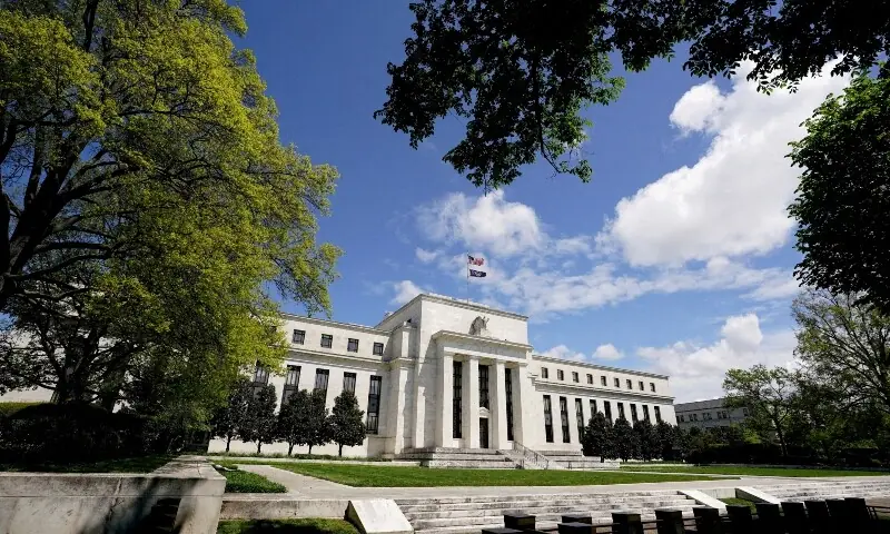 The Federal Reserve building is set against a blue sky in Washington, US, on May 1, 2020. &mdash; Reuters/File