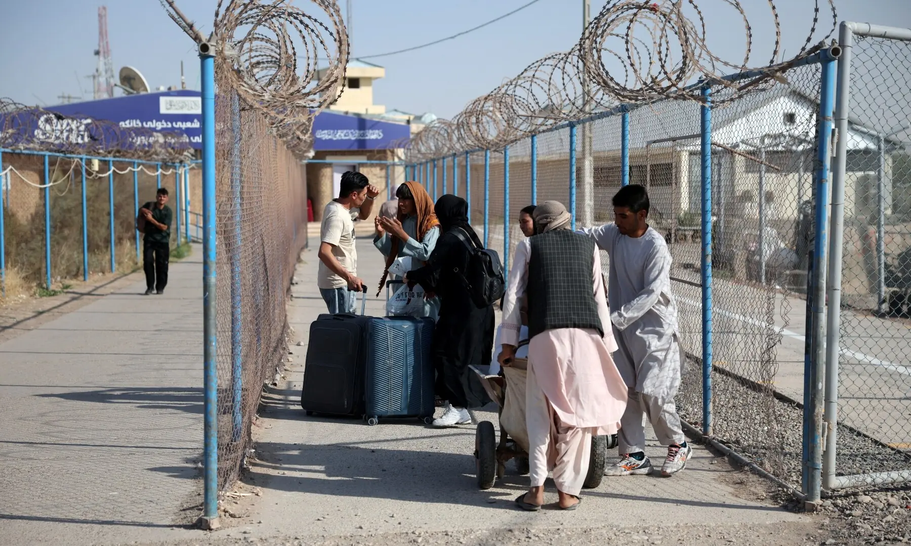 Afghan nationals carrying their belongings walk after crossing the border from Iran at the Islam Qala border crossing in Herat province, Afghanistan, on Sept 3, 2026. — Reuters Afghan nationals carrying their belongings walk after crossing the border from Iran at the Islam Qala border crossing in Herat province, Afghanistan, on Sept 3, 2026. — Reuters