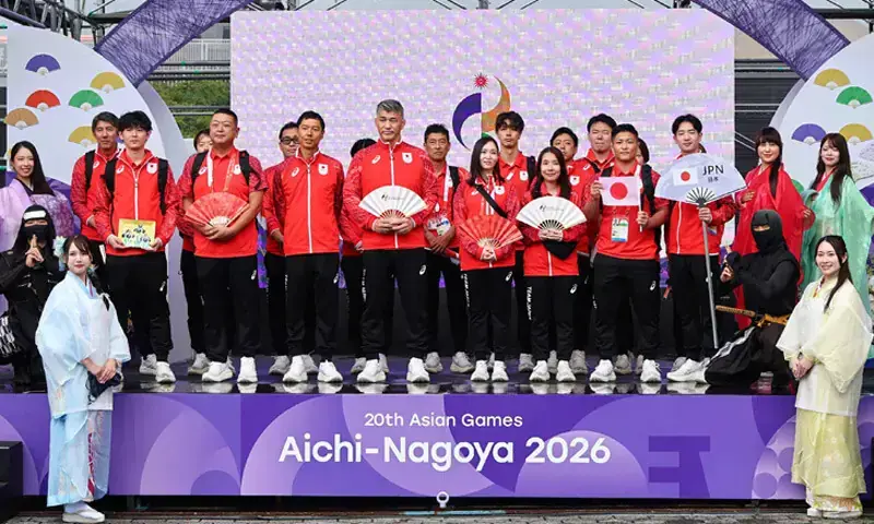 NAGOYA: Members of the Japanese delegation attend a welcome ceremony at the Athletes’ Village for the Asian Games on Wednesday.—AFP NAGOYA: Members of the Japanese delegation attend a welcome ceremony at the Athletes’ Village for the Asian Games on Wednesday.—AFP