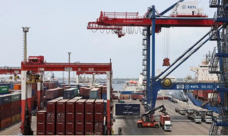Shipping containers are stacked at Karachi Gateway Terminal Limited (KGTL) in the port area of Karachi on June 23, 2026. &mdash; Reuters