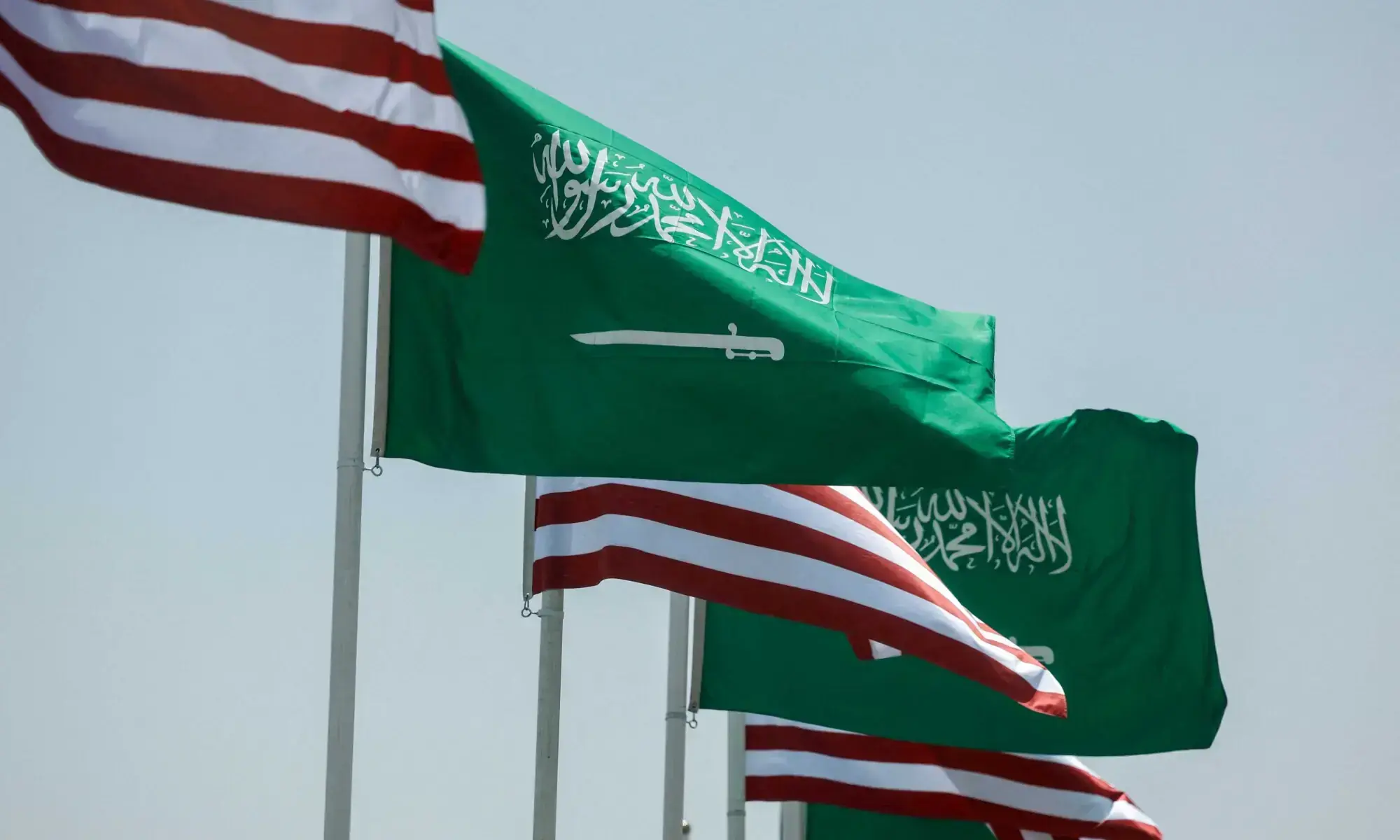 US and Saudi flags flutter along a highway of Riyadh, as pictured through the glass of a car, ahead of the arrival of US President Donald Trump to Riyadh, Saudi Arabia May 12, 2025. &mdash; Reuters/File