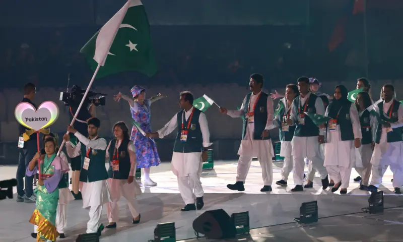 Members of Pakistan's delegation wave the national flag during the opening ceremony of the 2026 Asian Games at Paloma Mizuho Stadium in Nagoya on September 19, 2026.--AFP Members of Pakistan's delegation wave the national flag during the opening ceremony of the 2026 Asian Games at Paloma Mizuho Stadium in Nagoya on September 19, 2026.--AFP