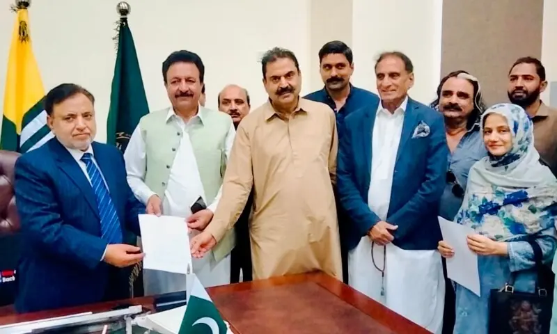 PPP legislators Mukhtar Ahmed Abbasi and Deevan Ali Chughtai hand over the nomination papers of the PPP's Chaudhry Latif Akbar (2nd R) as his secondary and proposer, respectively, to AJK Chief Election Commissioner (Retd) Justice Ghulam Mustafa Mughal at his office in Muzaffarabad on September 19, 2026. — Photo by author PPP legislators Mukhtar Ahmed Abbasi and Deevan Ali Chughtai hand over the nomination papers of the PPP's Chaudhry Latif Akbar (2nd R) as his secondary and proposer, respectively, to AJK Chief Election Commissioner (Retd) Justice Ghulam Mustafa Mughal at his office in Muzaffarabad on September 19, 2026. — Photo by author