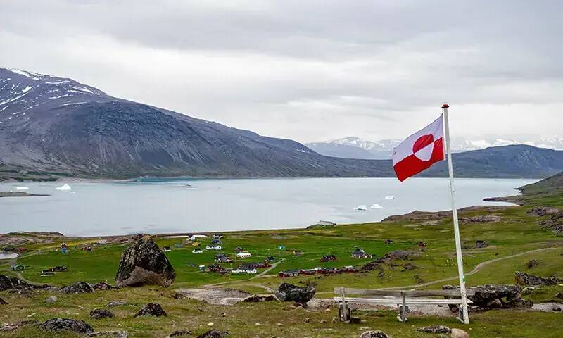Greenland's flag flies in Igaliku settlement, Greenland, July 5, 2024. &mdash; Reuters/File