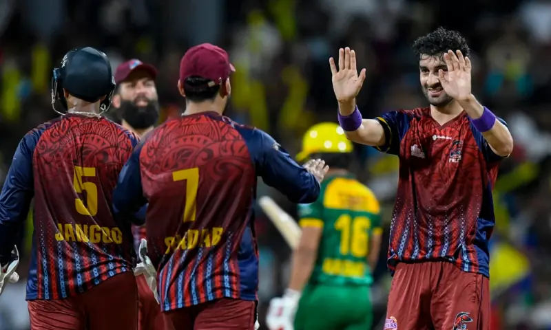 Sufiyan Muqeem celebrates with Shadab Khan during the final of the Caribbean Premiere League between Antigua and Barbuda Falcons and the Jamaica Kingsmen on September 20, 2026.--Courtesy CPL T20 Sufiyan Muqeem celebrates with Shadab Khan during the final of the Caribbean Premiere League between Antigua and Barbuda Falcons and the Jamaica Kingsmen on September 20, 2026.--Courtesy CPL T20